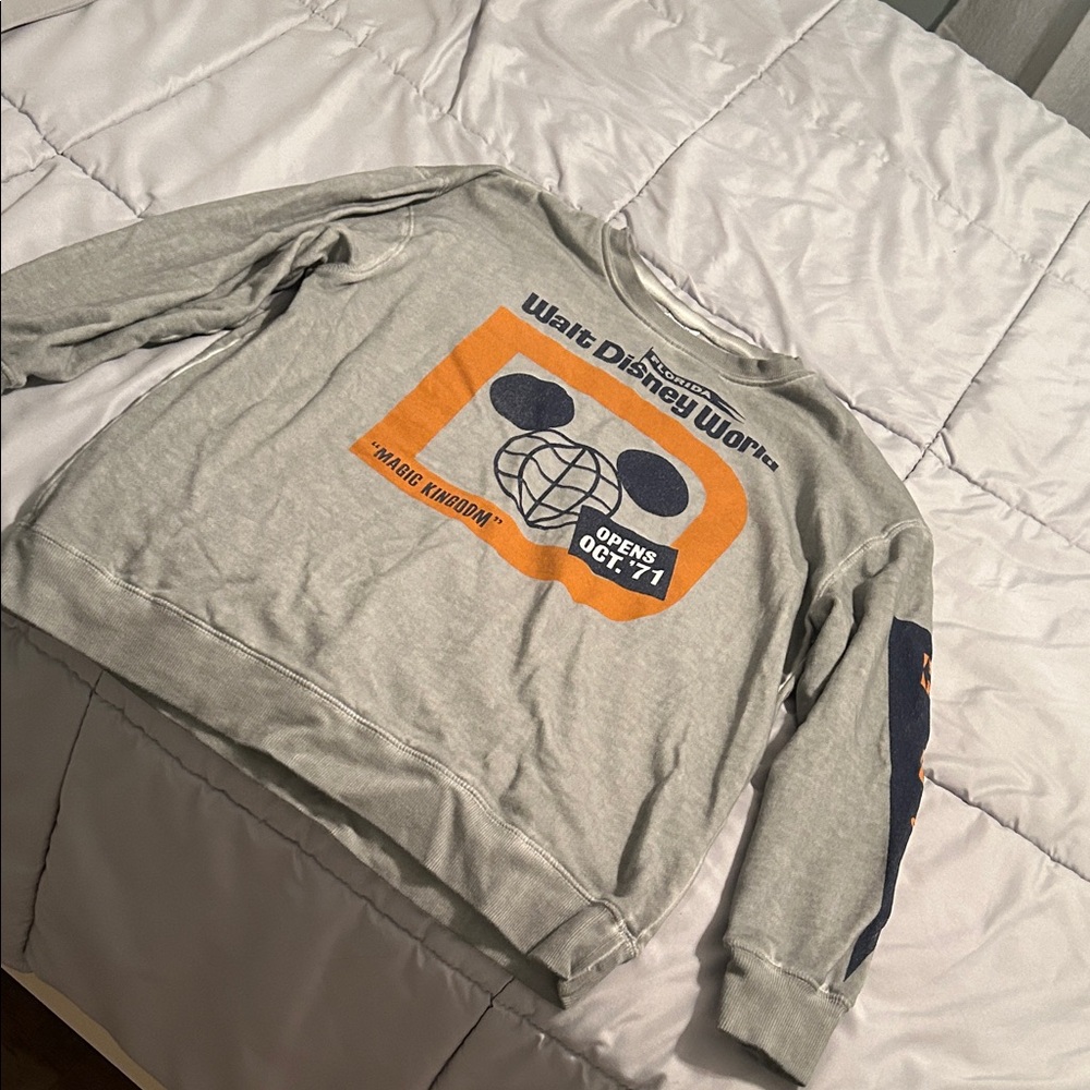 Disney Light Gray Crewneck Sweatshirt with Orange and Navy Graphic
